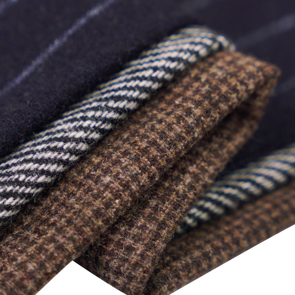 50% lana, 30% poliestere, 20% altra fibra, 320 G/M, bianco sporco + nero, tessuto di flanella twill, ML-C-22104